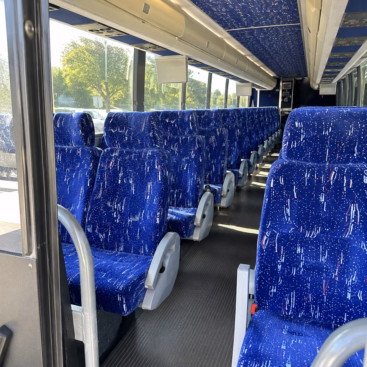 newton 50 passenger charter bus inside