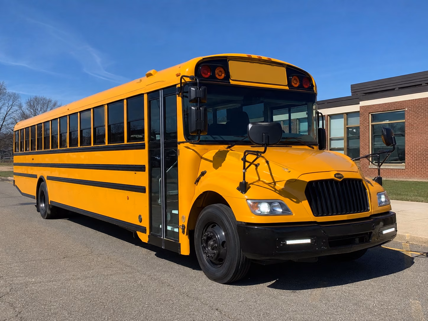 school bus rentals for newton athletic and performing arts trips